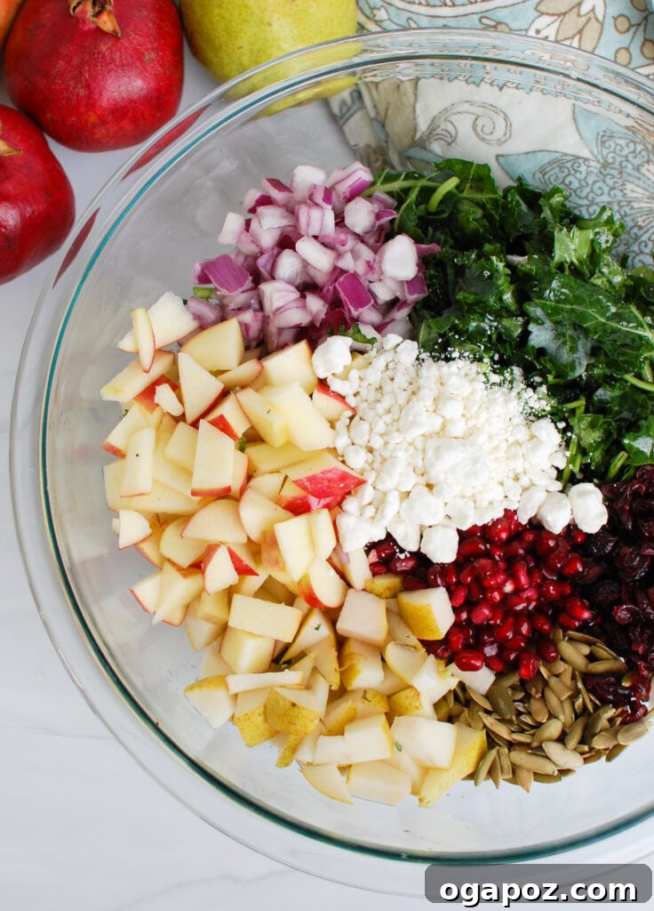 Crisp Autumn Harvest Salad 5 Close up of a bowl of Easy Fall Salad with various ingredients ready to be mixed