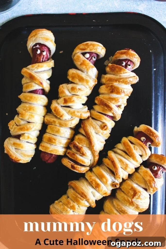 Spooky Sausage Wraps 7 A final close-up of Mummy Hot Dogs, perfectly golden and ready for a festive Halloween celebration.
