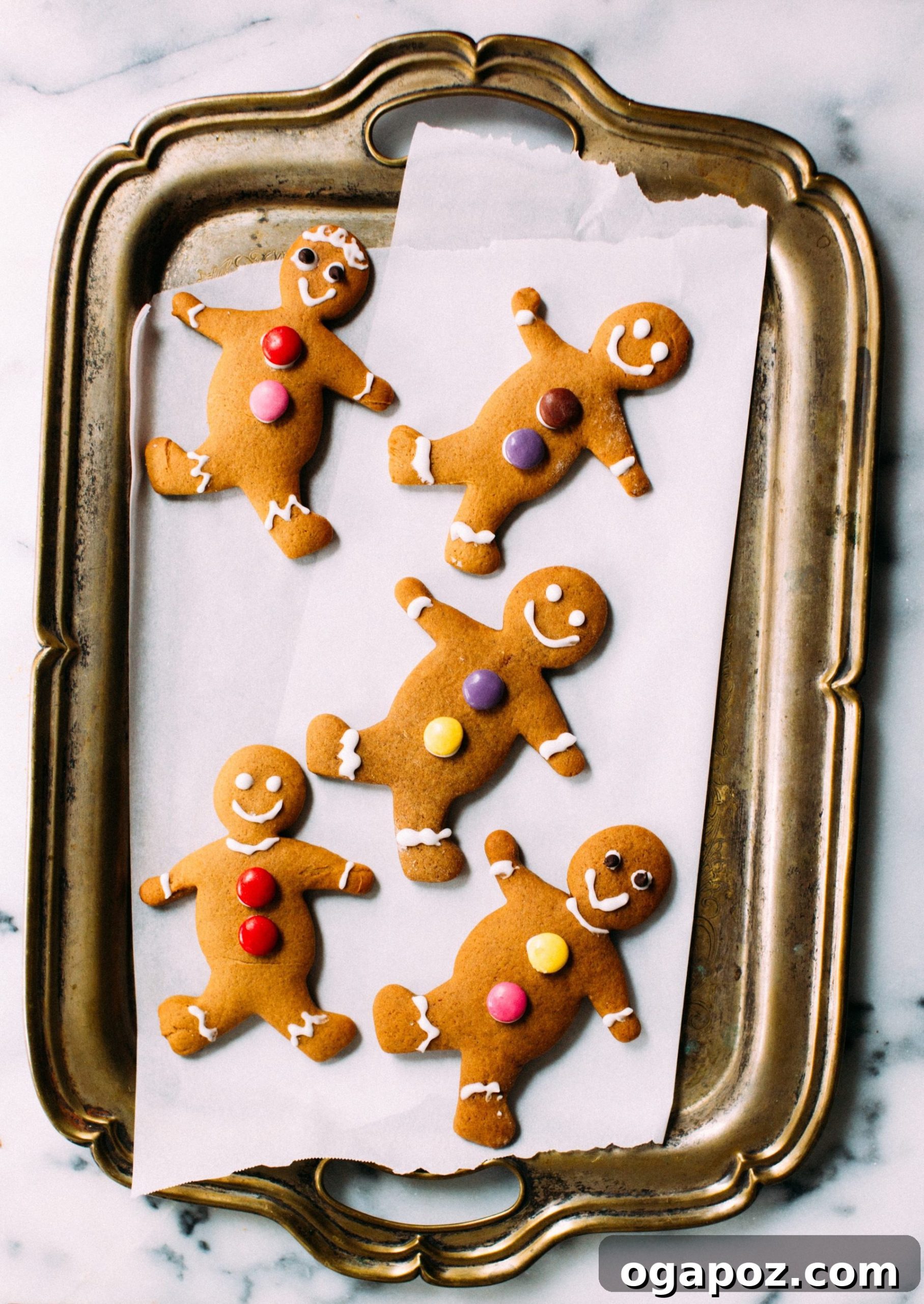 Melt-in-Your-Mouth Chewy Gingerbread 5 Decorated gingerbread men cookies with colorful icing and candies