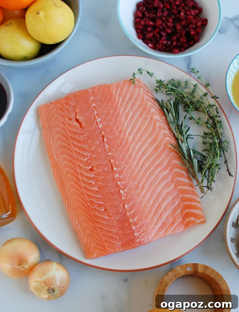Jeweled Pomegranate Salmon 3 Ingredients for Honey Glazed Pomegranate Salmon laid out on a kitchen counter