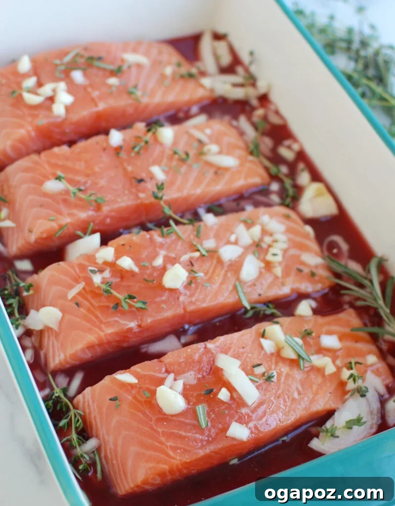 Jeweled Pomegranate Salmon 6 Close-up of Honey Glazed Pomegranate Salmon garnished with orange slices and herbs