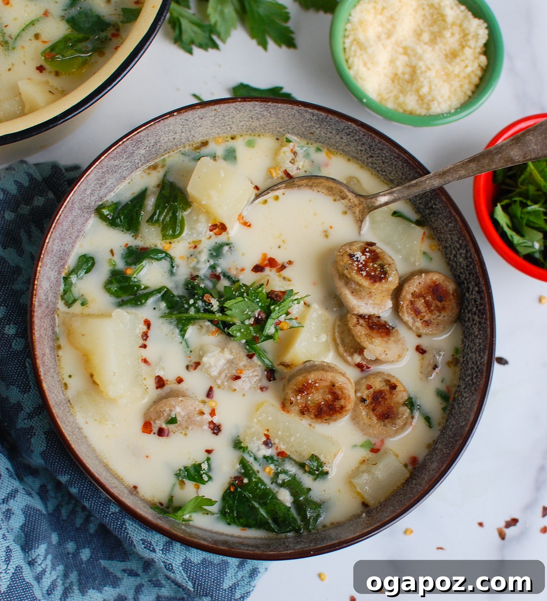 Effortless Slow Cooker Zuppa Toscana 4 Slow Cooker Zuppa Toscana garnished with fresh parsley.