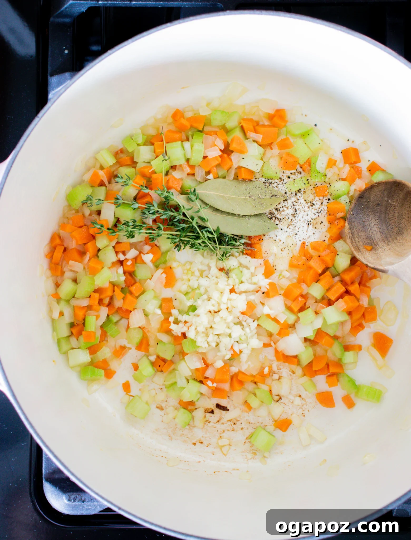 Effortless Vegetable Bean Soup 6 The vegetable bean soup simmering gently in a Dutch oven, with all ingredients combined.