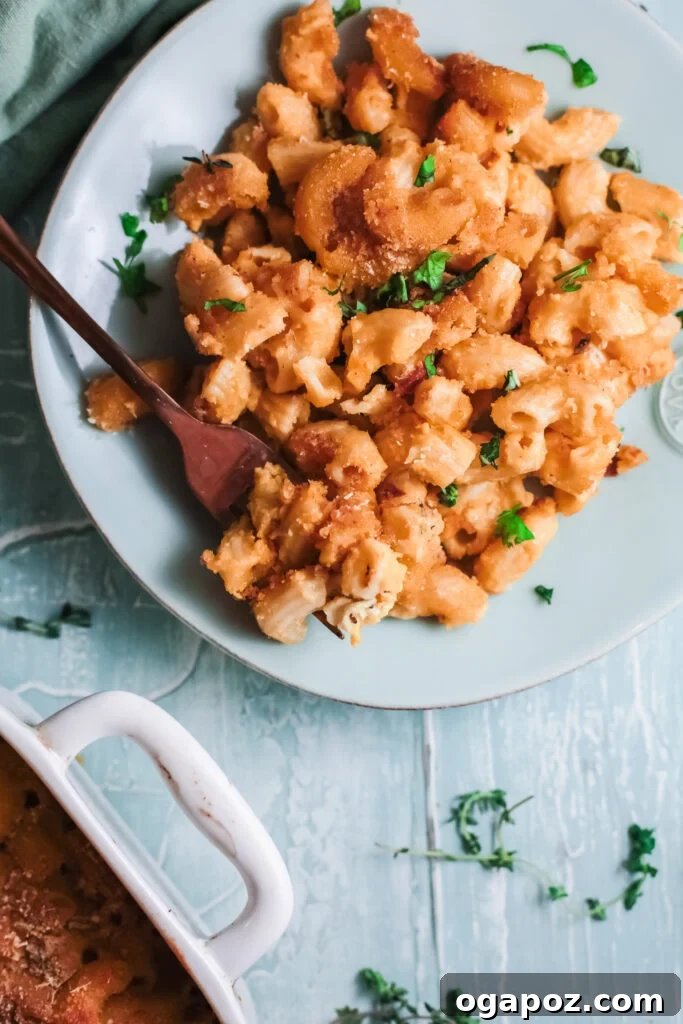 Velvet Pumpkin Mac and Cheese 2 Pumpkin Mac and Cheese on a teal plate, ready to be served