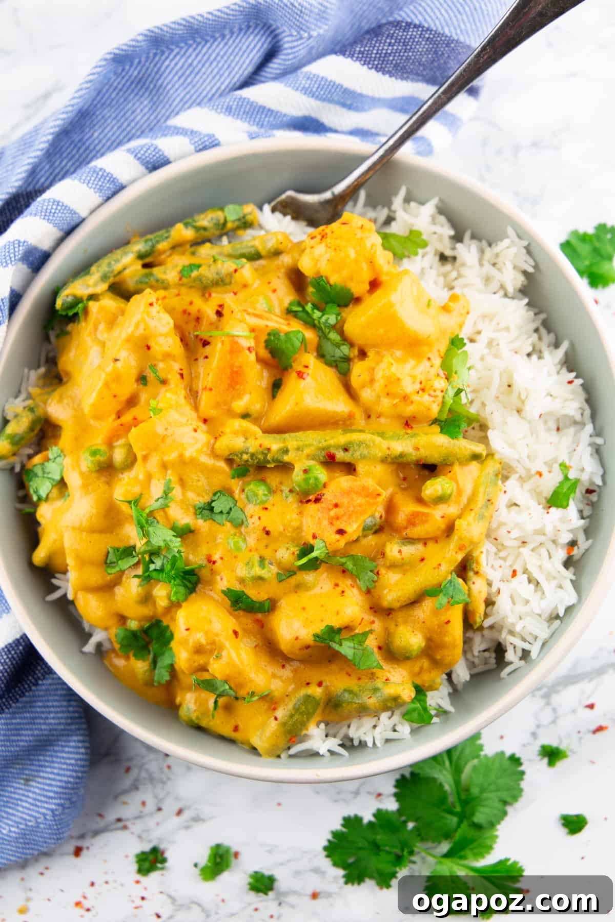 Flavorful Indian Vegetarian Dinner Ideas 15 A delectable bowl of Veggie Korma, showcasing its rich, creamy sauce, tender mixed vegetables, and aromatic spices.
