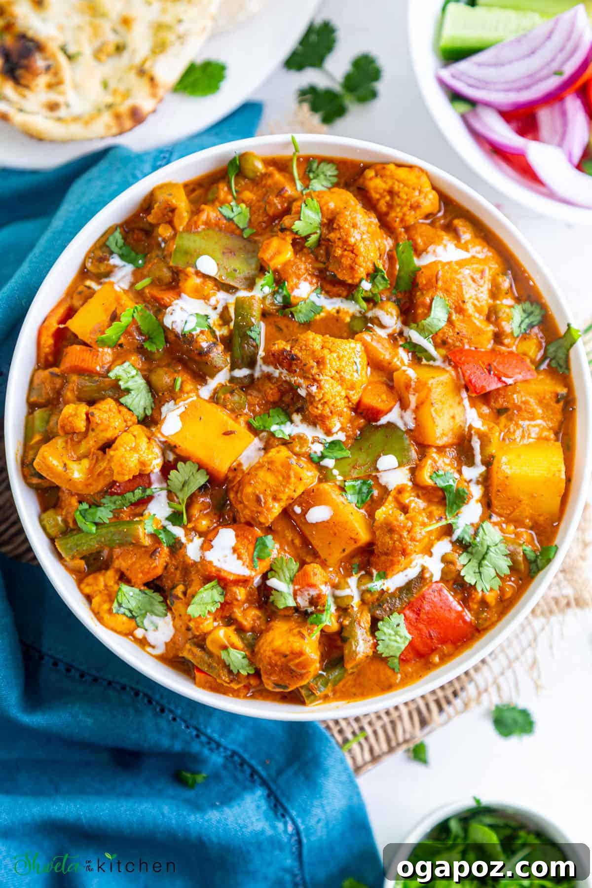 Flavorful Indian Vegetarian Dinner Ideas 16 A vibrant Mixed Vegetable Curry, brimming with a delightful variety of fresh vegetables in a rich, spiced sauce.