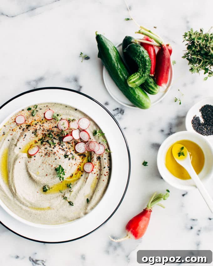 Black Tahini Hummus 2 A serene morning view from a high-rise apartment, capturing the quiet beauty of a city waking up, reflecting the early morning theme.