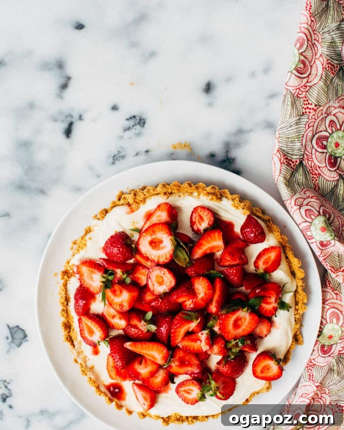 Silky Strawberry White Chocolate Cloud Tart 2 Beautifully presented White Chocolate Mousse Strawberry Tart, garnished with fresh strawberries