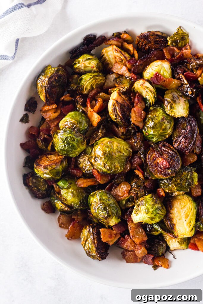 Roasted Brussels Sprouts and Bacon Delight 3 Roasted Brussels Sprouts with Bacon served in a white bowl