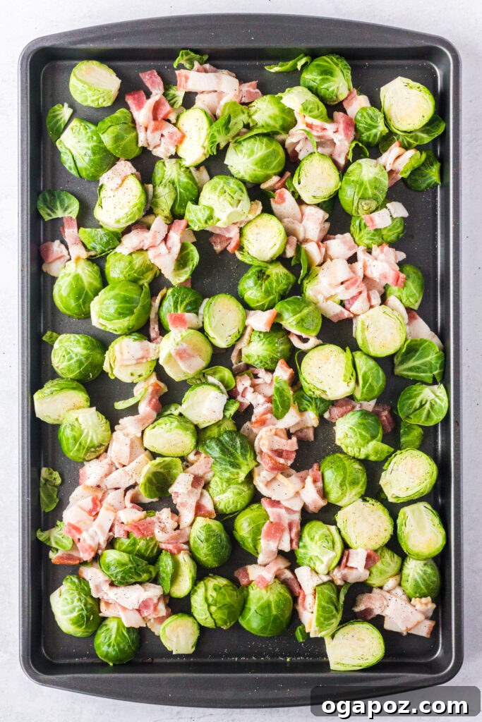 Roasted Brussels Sprouts and Bacon Delight 8 Raw ingredients for Roasted Brussels Sprouts with Bacon spread on a baking sheet, ready for the oven