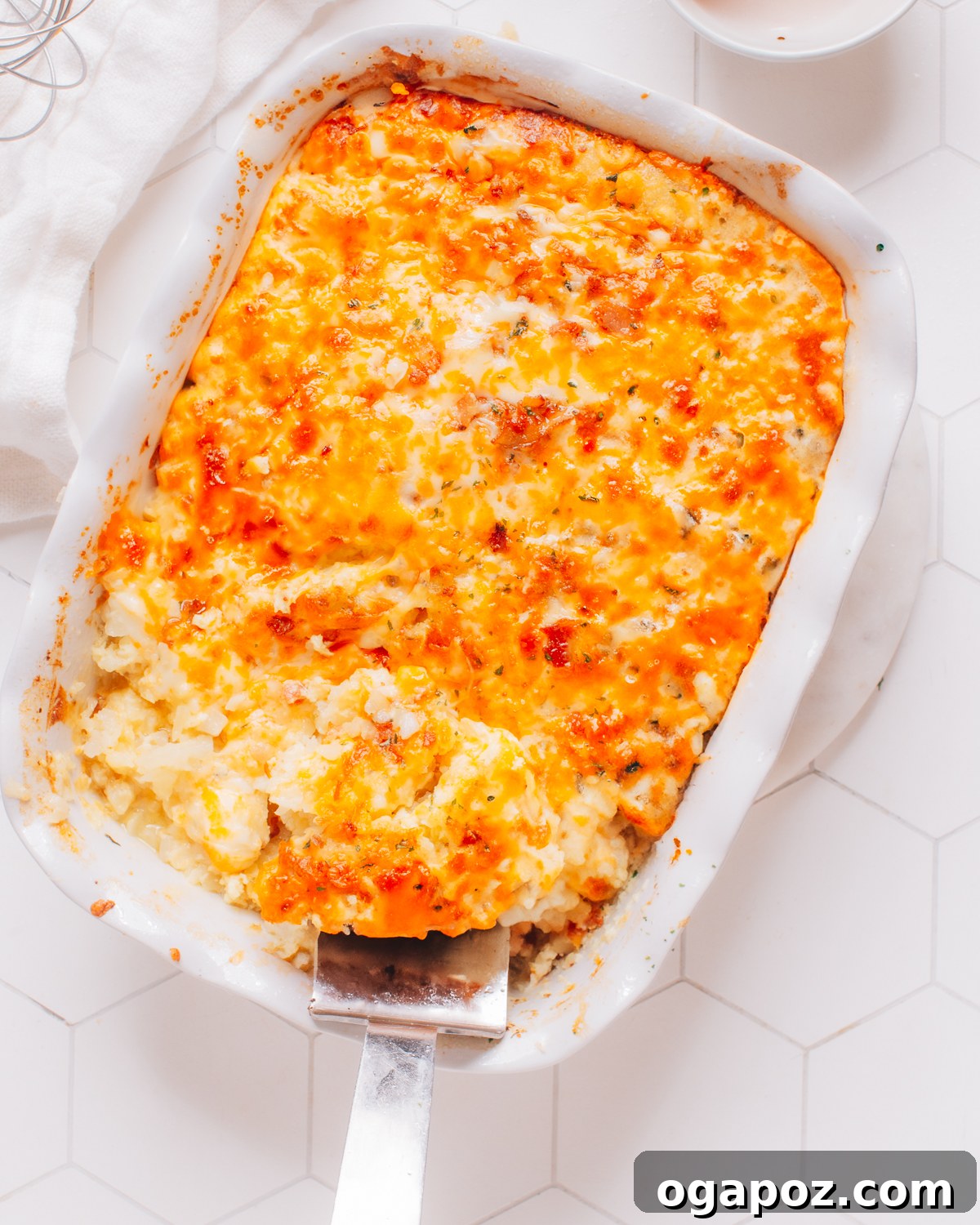 Effortless Comfort Chicken Potato Bake 2 Golden brown chicken potato casserole in a large baking dish, ready to serve.