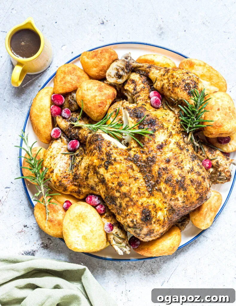Succulent Instant Pot Rotisserie Chicken 2 Platter of Instant Pot Rotisserie Chicken, garnished with fresh herbs