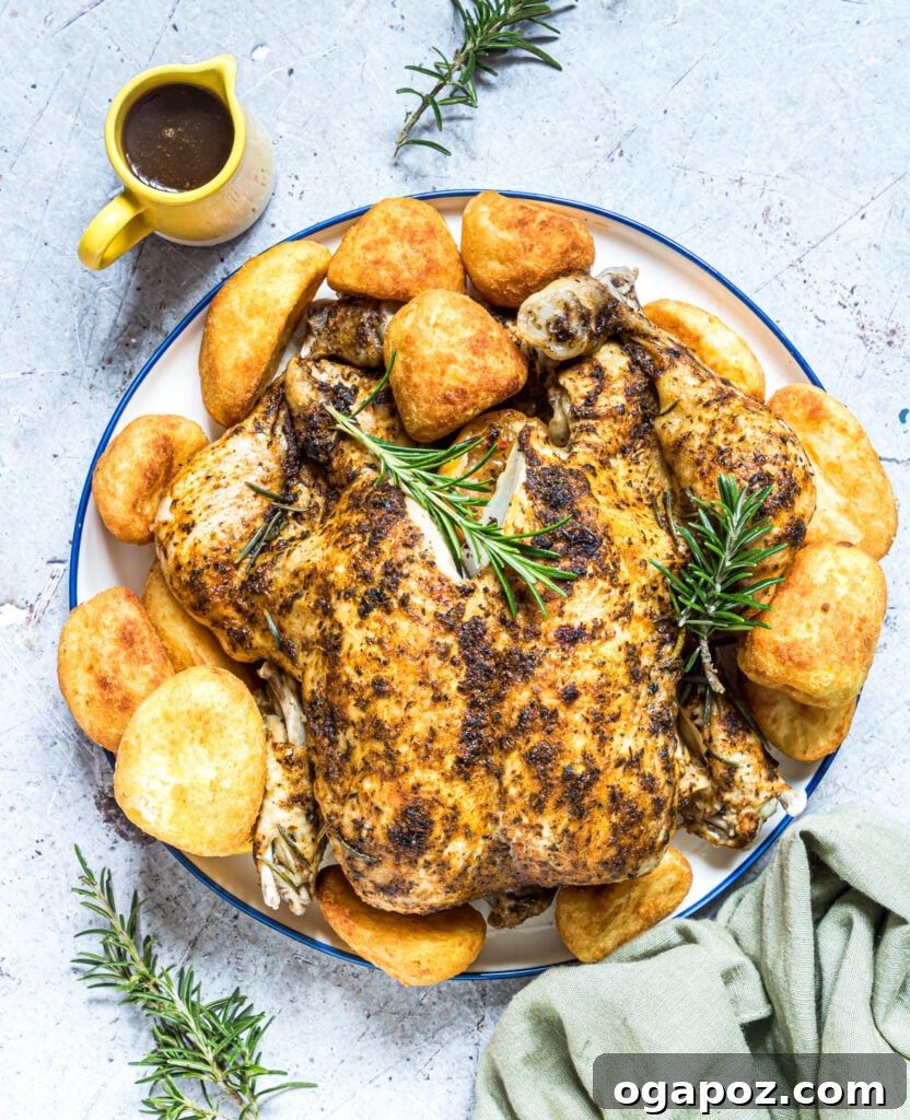 Succulent Instant Pot Rotisserie Chicken 3 Instant Pot Rotisserie Chicken garnished with fresh rosemary