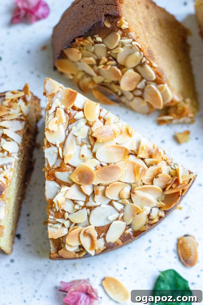 Heavenly Almond Cake 4 A beautifully baked slice of Almond Cake, showing its moist interior and almond topping.