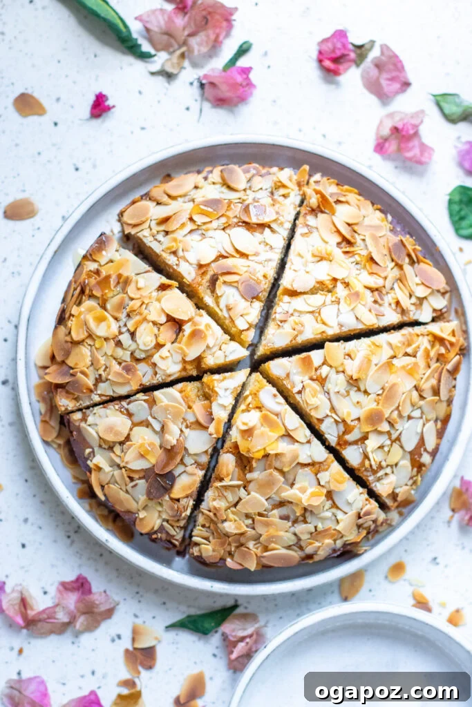 Heavenly Almond Cake 9 Top-down view of the whole Almond Cake, with a golden brown crust and almond topping.