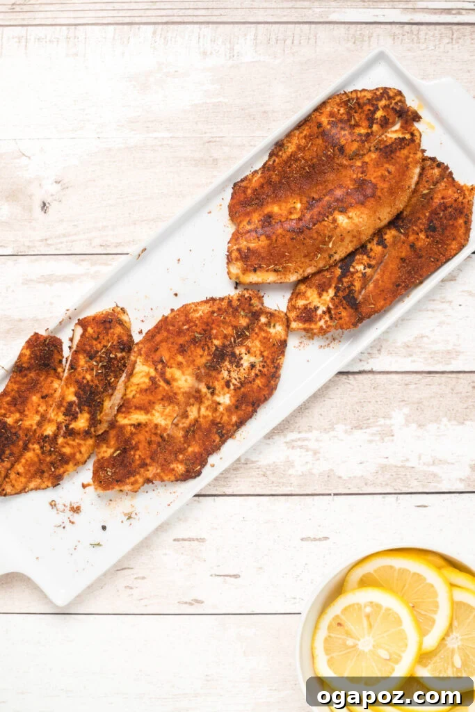 Effortless Blackened Tilapia 8 Searing Easy Blackened Tilapia Fish in a hot skillet
