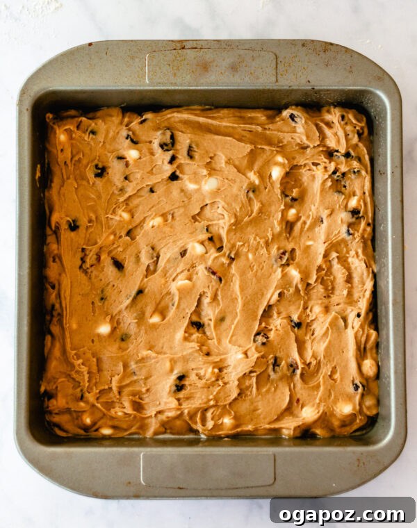 Crimson Cranberry Dream Bars 8 Cranberry Bliss Bars batter spread evenly in a baking pan