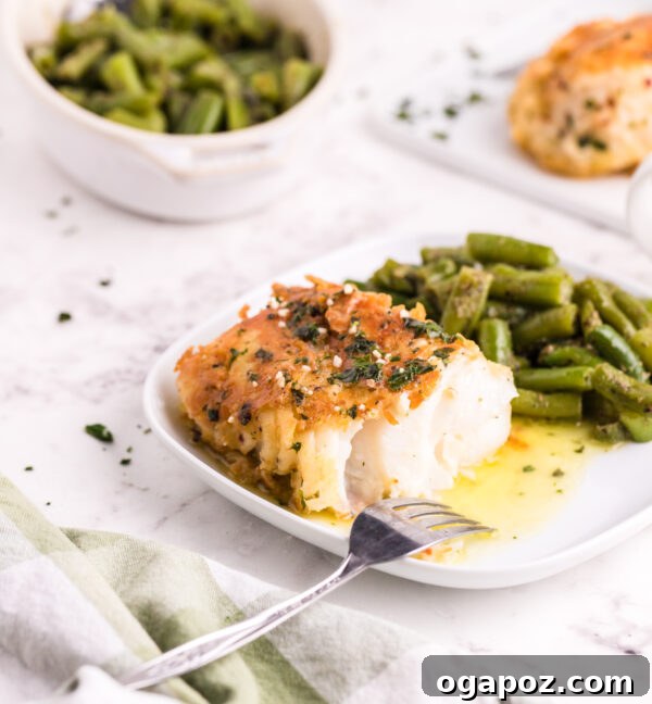 Golden Garlic Butter Seared Cod 10 Plated pan-fried garlic butter cod with a side of fresh green beans, ready to eat