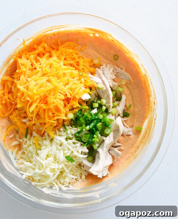 Ultimate Buffalo Chicken Dip Recipe 6 All Buffalo Chicken Dip ingredients mixed in a bowl