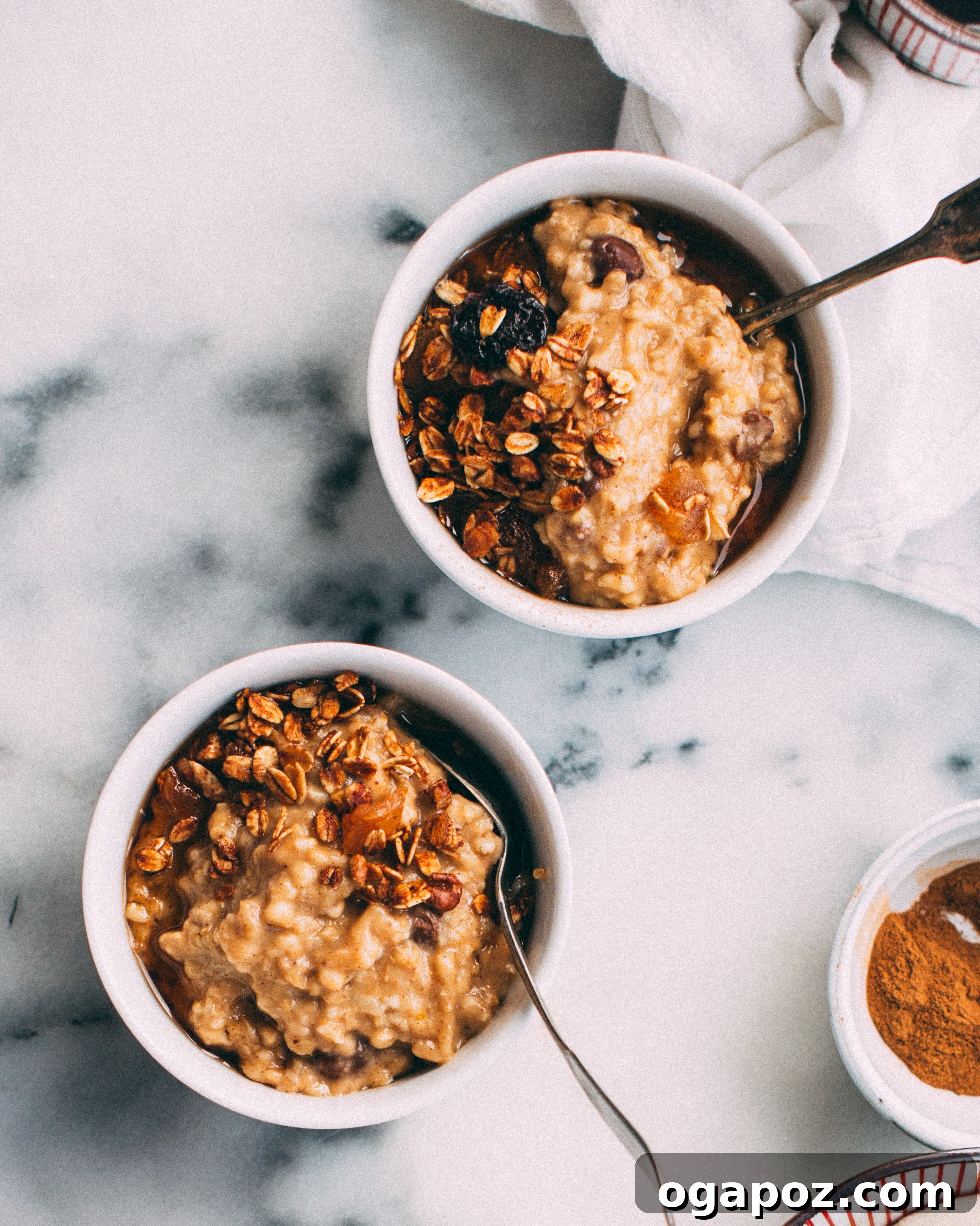 Morning Magic Pumpkin Spice Slow Cooker Oats 3 Ingredients for slow cooker pumpkin spice oatmeal laid out on a kitchen counter, including oats, pumpkin puree, milk, and spices.