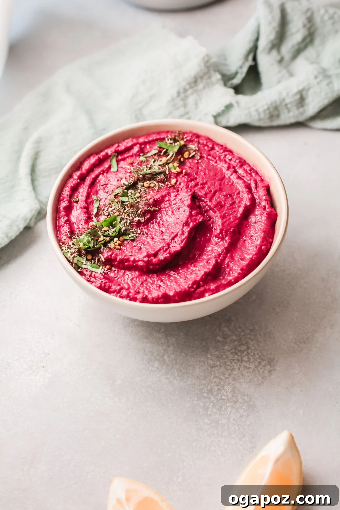Vibrant Beetroot Hummus 5 Roasted beets tossed with olive oil and spices on a baking sheet, ready for roasting