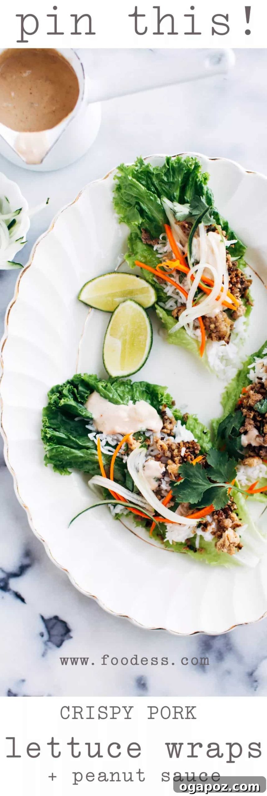 Crispy Pork Lettuce Wraps with Creamy Peanut Sauce 4 A vibrant spread of fresh ingredients and crispy pork filling for building homemade lettuce wraps.