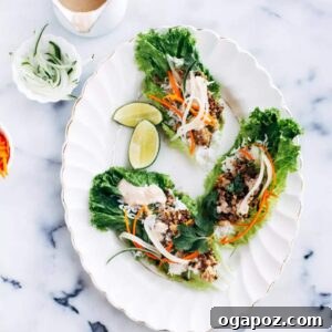Delicious Crispy Pork & Peanut Sauce Lettuce Wraps served on a plate.