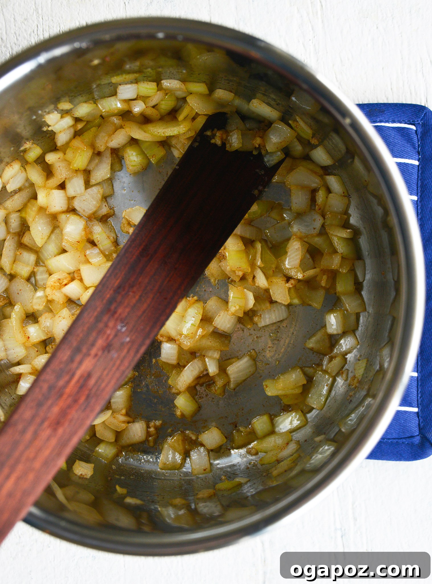 Instant Pot Cauliflower Soup onions in the pressure cooker.