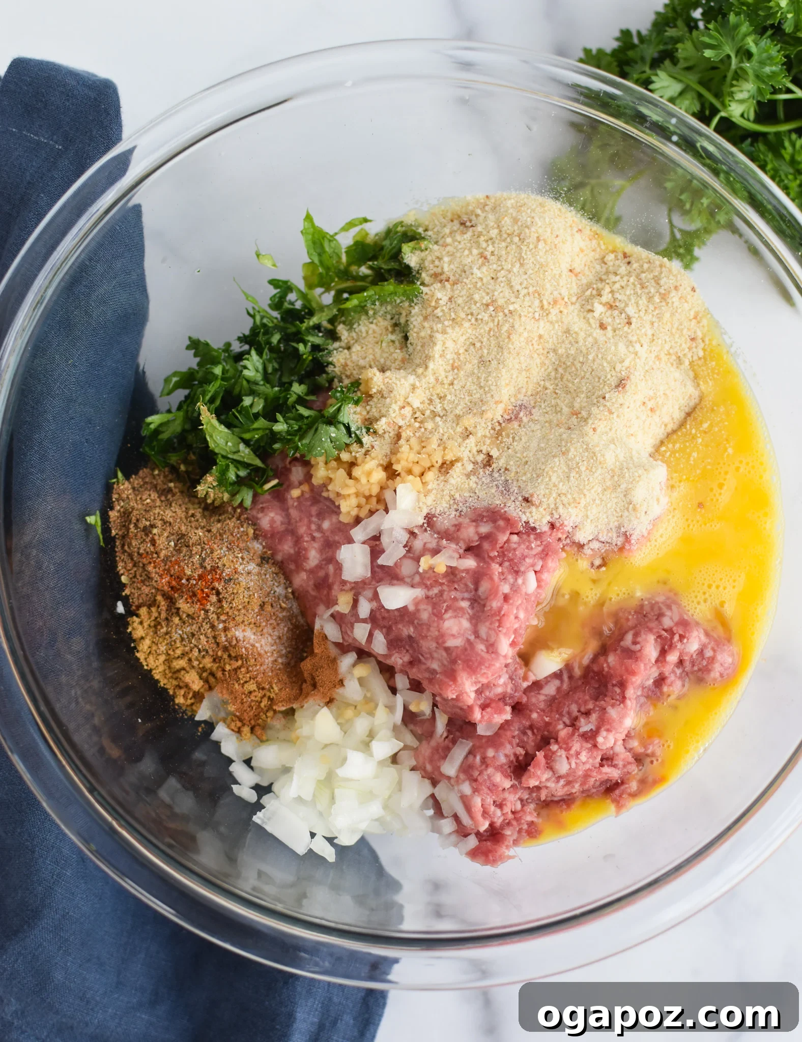 Spiced Lamb Kofta 6 All the Lamb Kofta ingredients, including ground lamb, fresh herbs, and spices, mixed in a large bowl, ready for shaping.