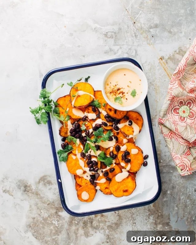 Loaded Sweet Potato Nachos with a Quick 3-Ingredient Cheese Sauce 4 Theo enjoying his Sweet Potato Nachos