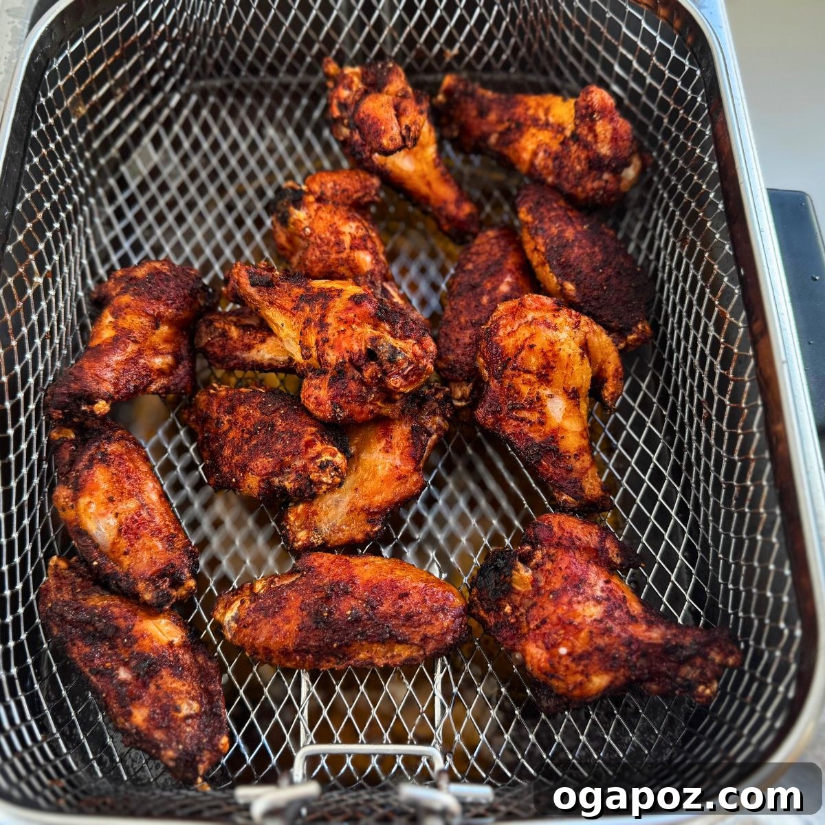 10 Grilling Secrets for Perfect Crispy Chicken Wings 11 Extra crispy smoked chicken wings on a wooden board.