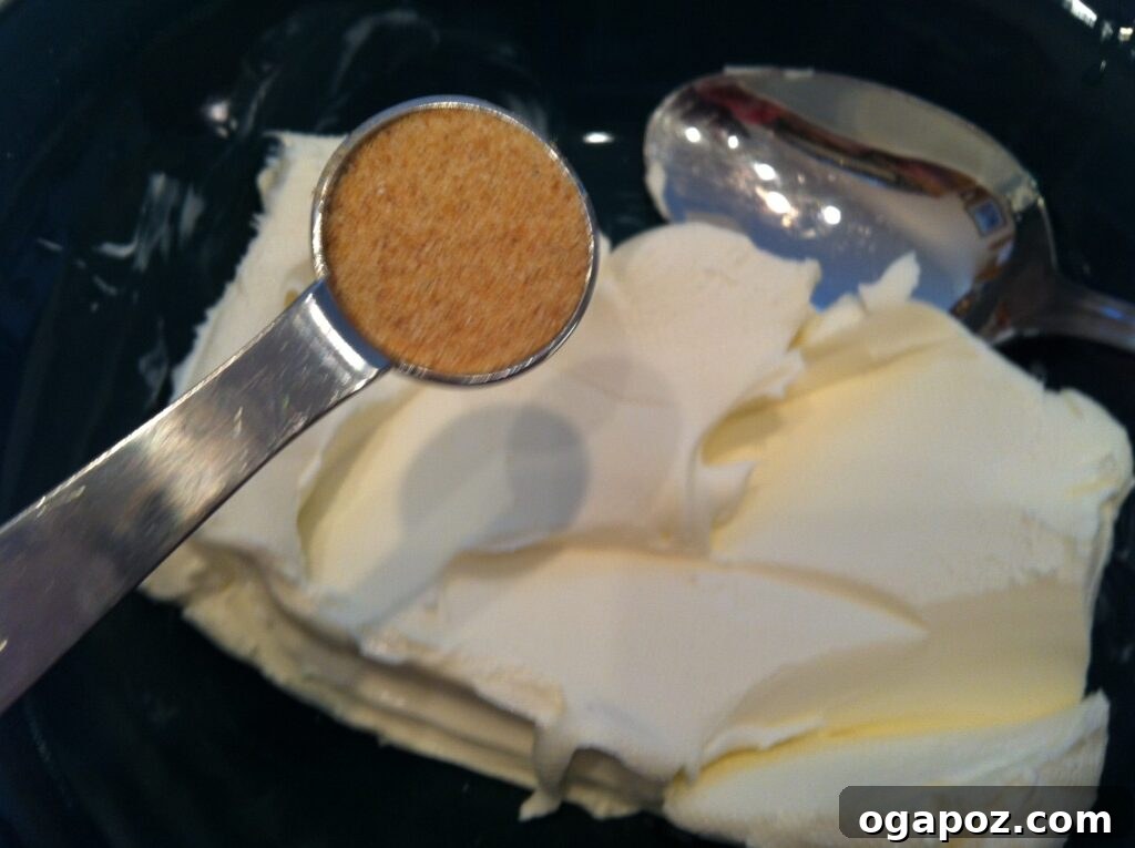 Garlic powder in cream cheese Adding garlic powder to cream cheese for Rosemary Cranberry Spread
