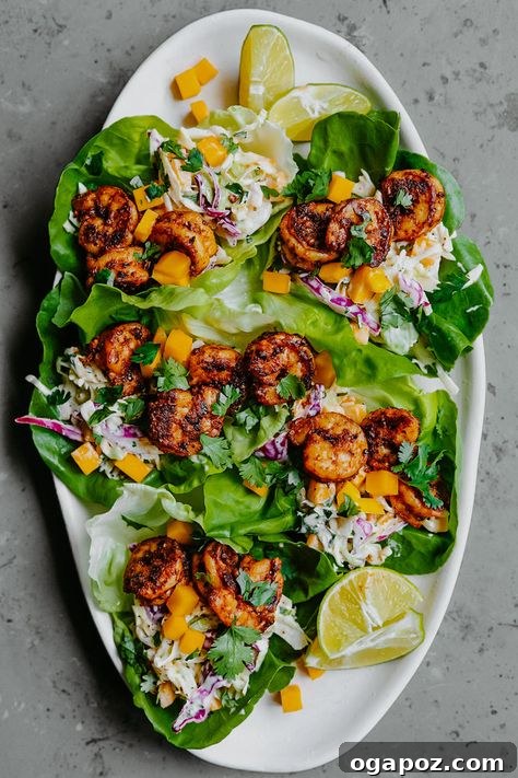 Healthy Shrimp Dinners You'll Crave 17 Fresh Shrimp and Mango Lettuce Wraps with avocado and red onion.