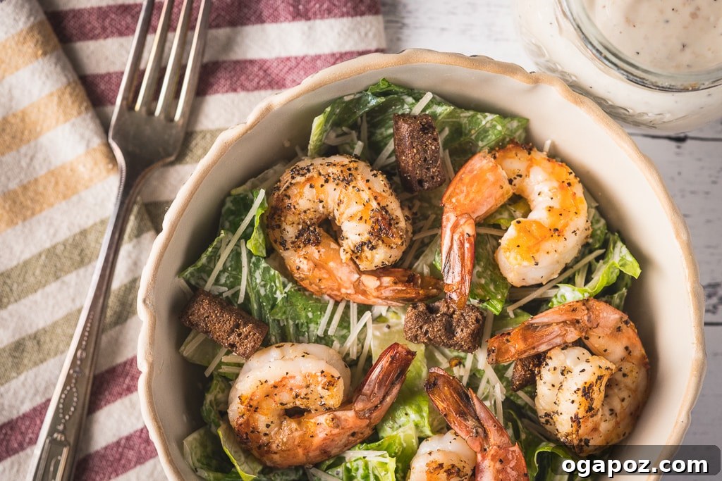 Healthy Shrimp Dinners You'll Crave 20 Inviting Grilled Shrimp Caesar Salad with a lemon wedge.
