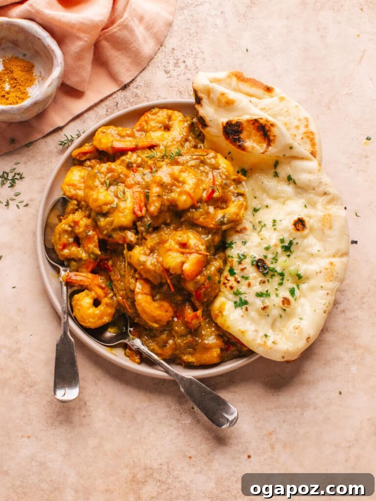 Healthy Shrimp Dinners You'll Crave 6 Spicy Jamaican Curry Shrimp served with warm naan bread.