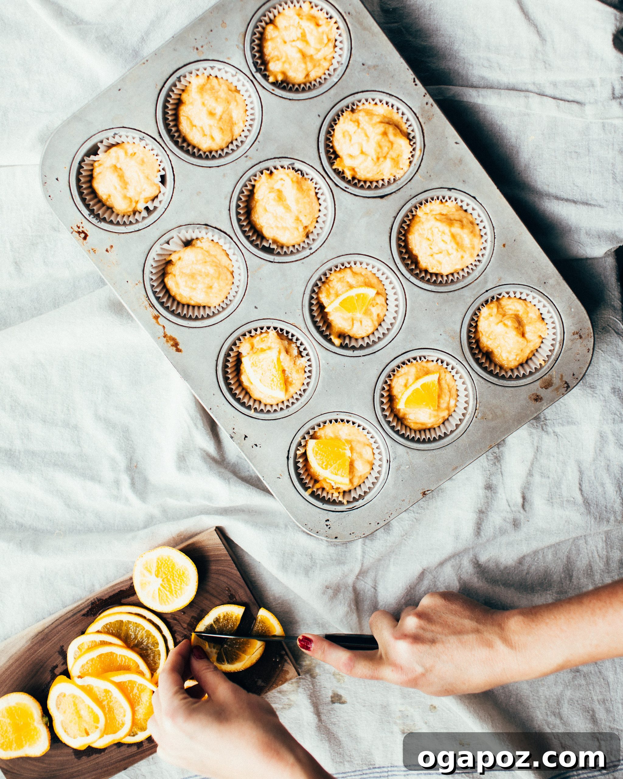 Zesty Orange Pumpkin Muffins 5 Baked Pumpkin-Orange Muffins on a wire rack, showing their plump and golden appearance.