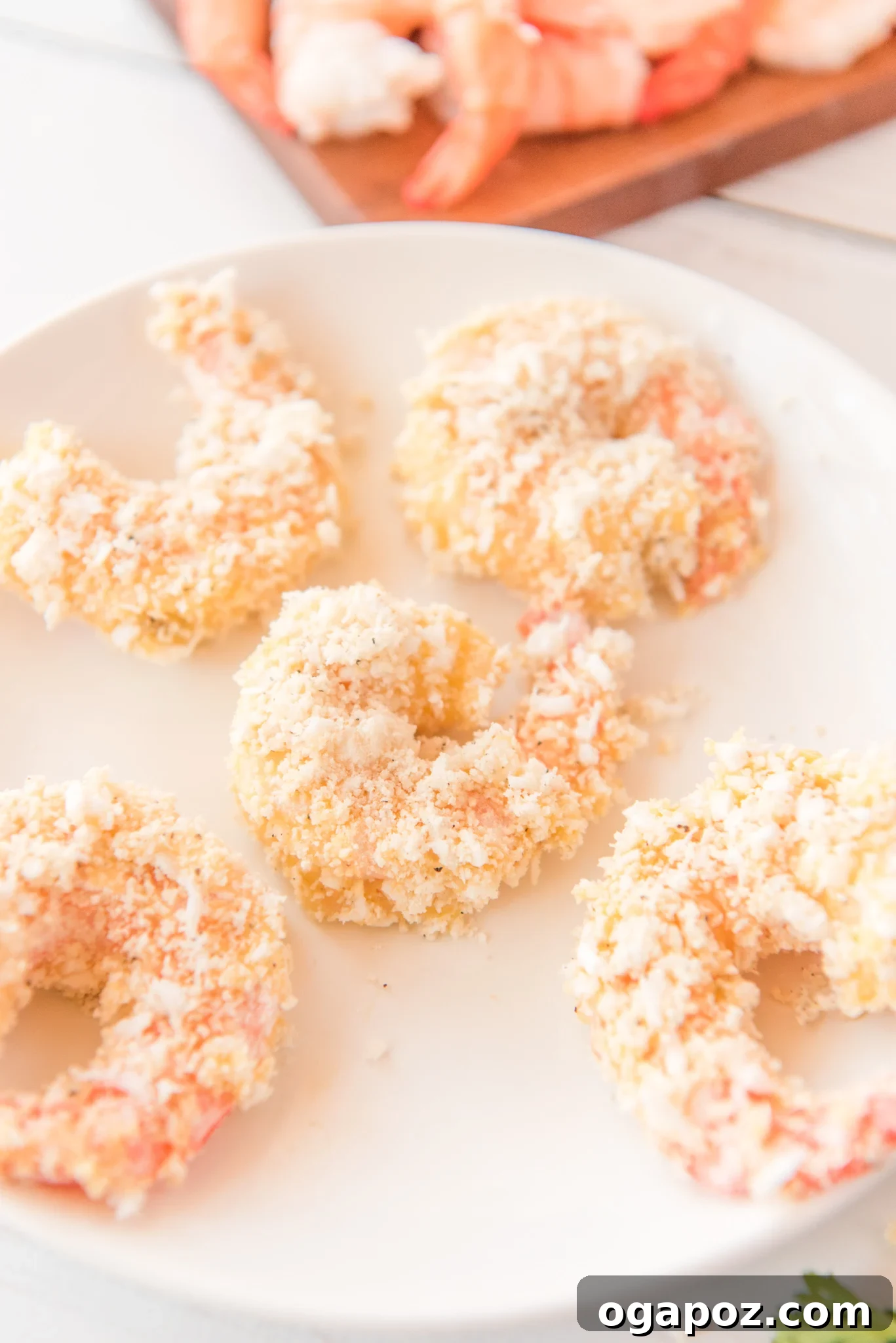 Crispy Air-Fried Coconut Shrimp 8 Air Fryer Coconut Shrimp on a plate.