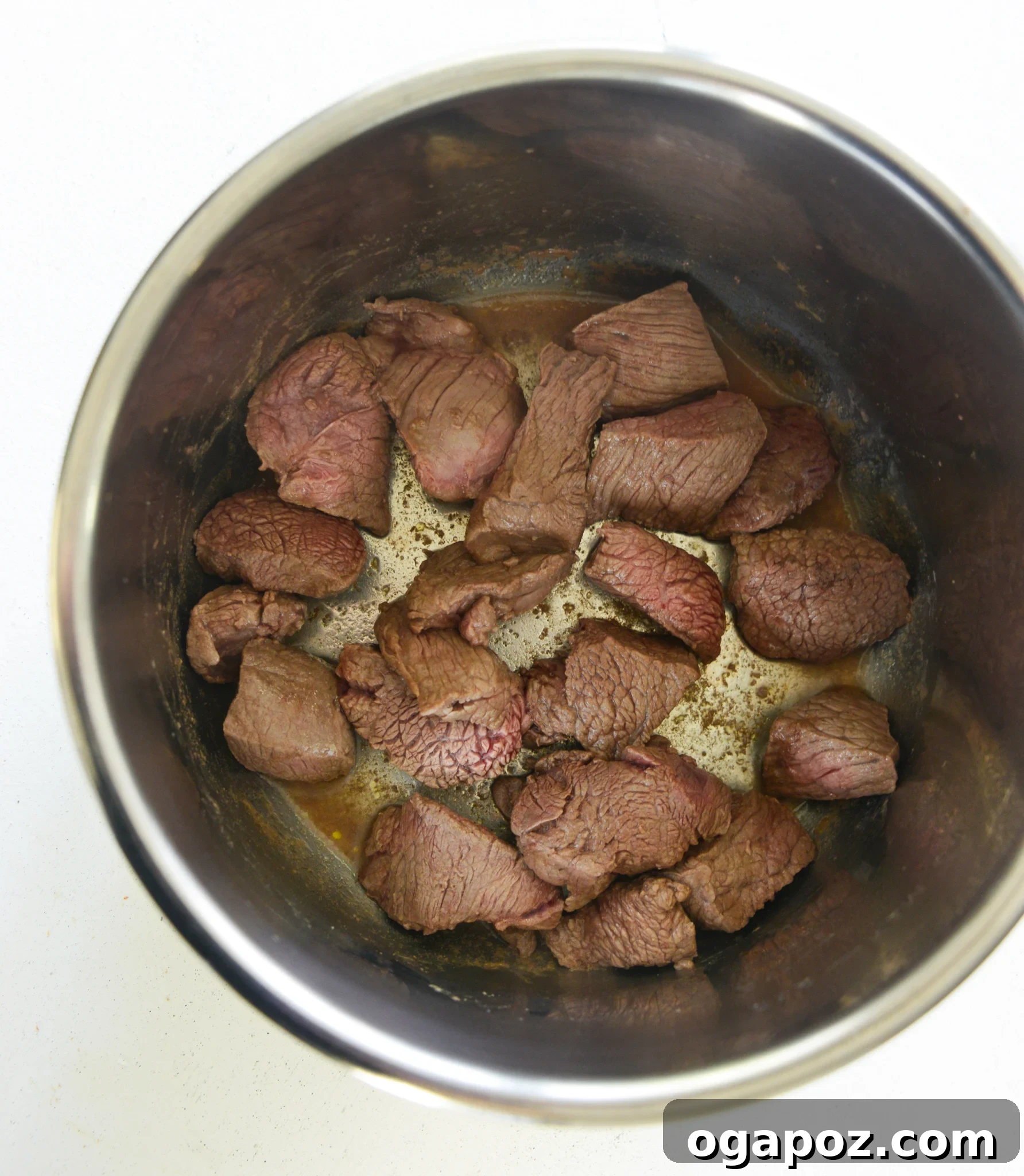 Quick and Tender Instant Pot Beef Stew 6 Instant Pot Beef Stew Recipe with aromatics cooking in the Instant Pot