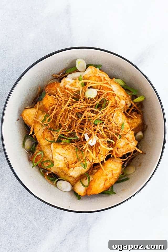 Halibut Perfection: Recipes You'll Adore 18 Ginger soy glazed halibut with crispy ginger and scallions, an irresistible Asian-inspired dish.