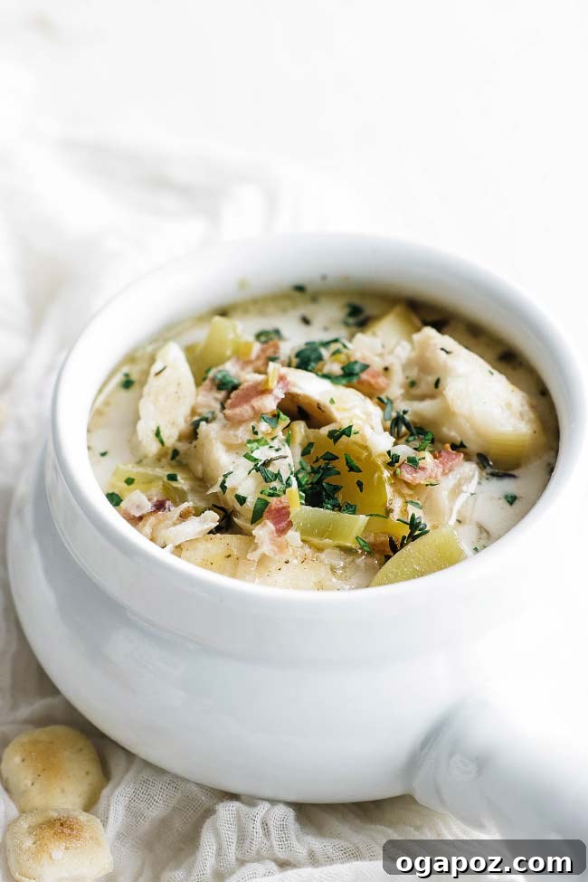 Halibut Perfection: Recipes You'll Adore 20 Hearty halibut chowder with potatoes, bacon, and herbs in a creamy broth, a perfect warming meal.