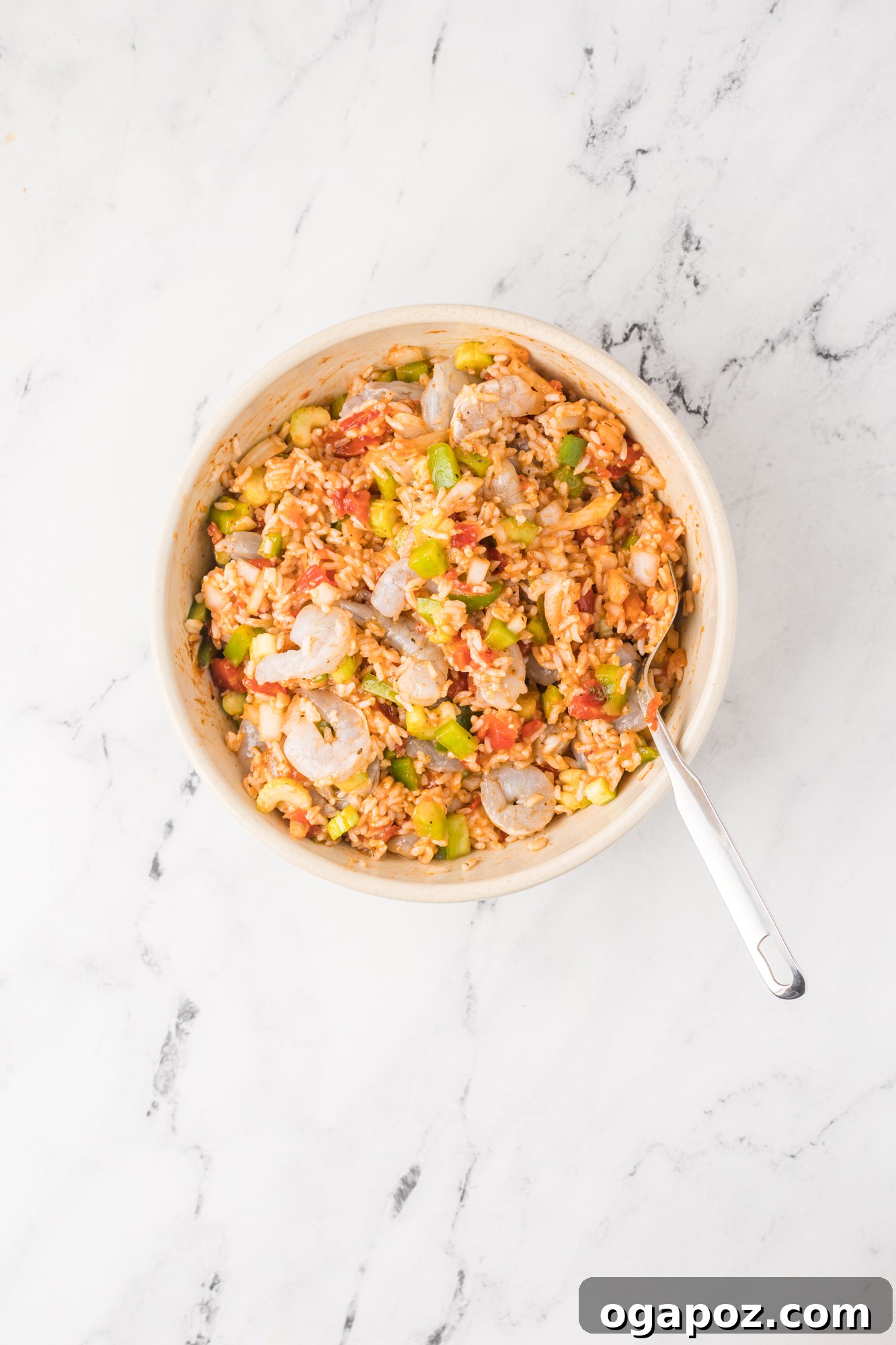 Spicy Shrimp Creole Delight 5 Shrimp Creole Recipe ingredients thoroughly seasoned in a bowl, ready for foil packets.