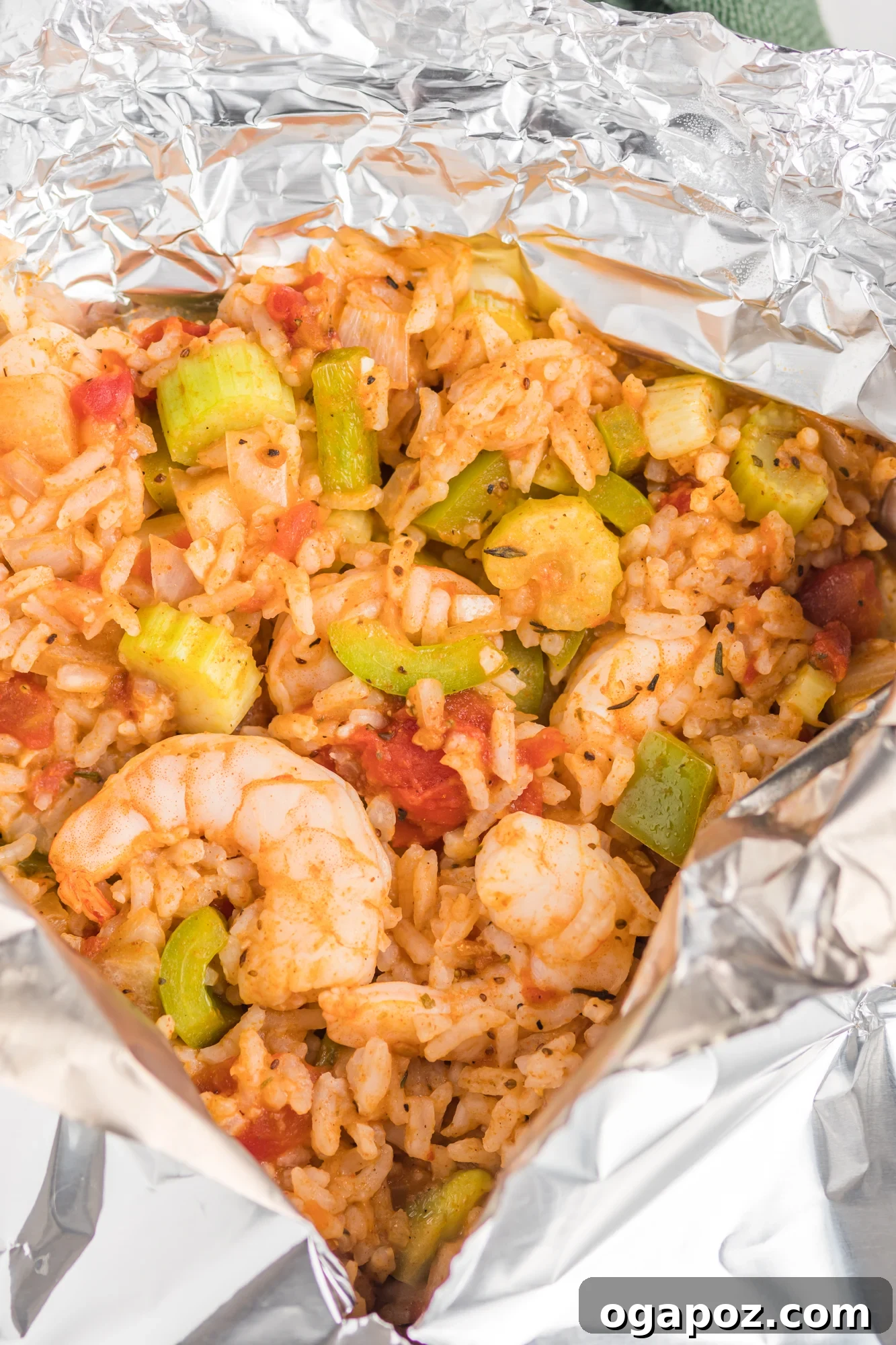 Spicy Shrimp Creole Delight 8 Shrimp Creole Recipe inside a foil packet, open and ready to be served.