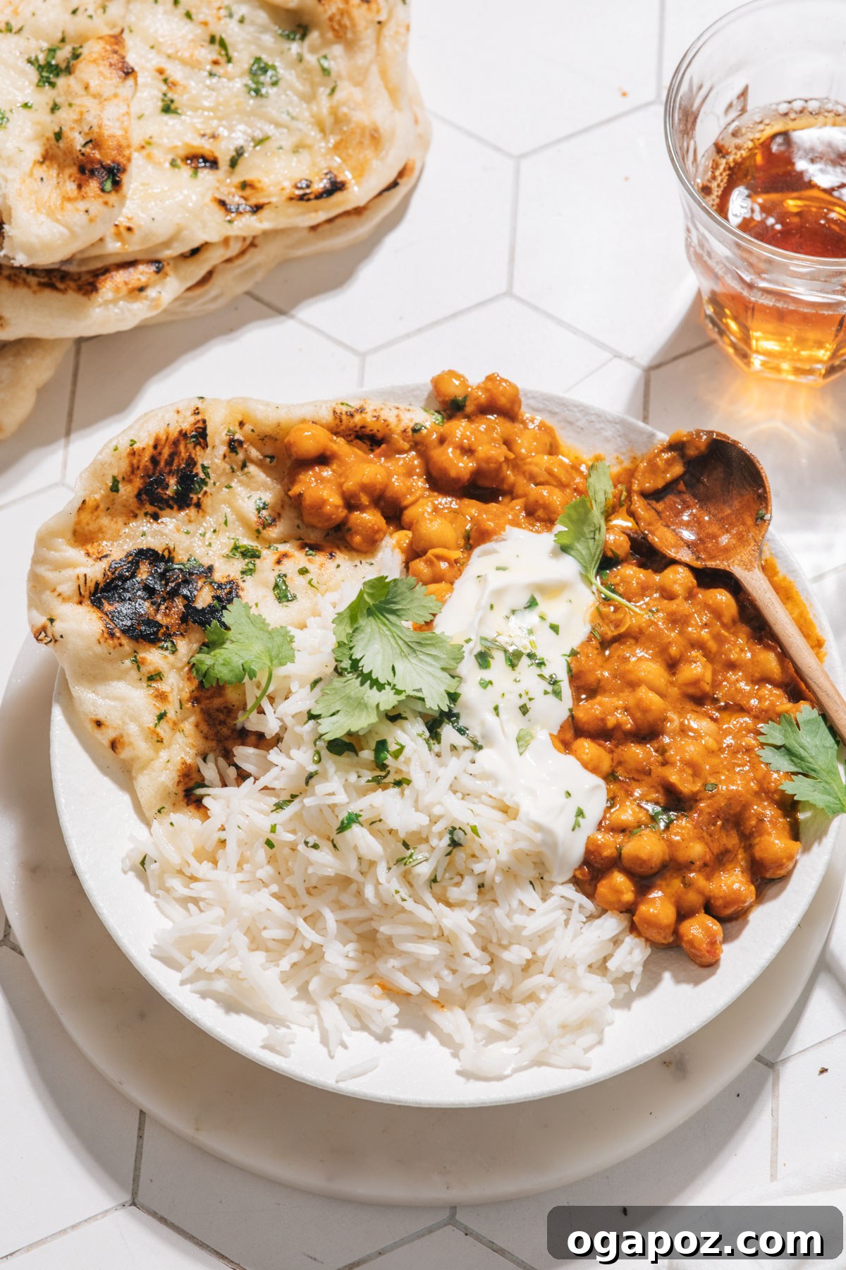 Speedy Coconut Curry Chickpeas 2 Delicious bowl of creamy Curry Chickpeas garnished with fresh cilantro, ready to be served