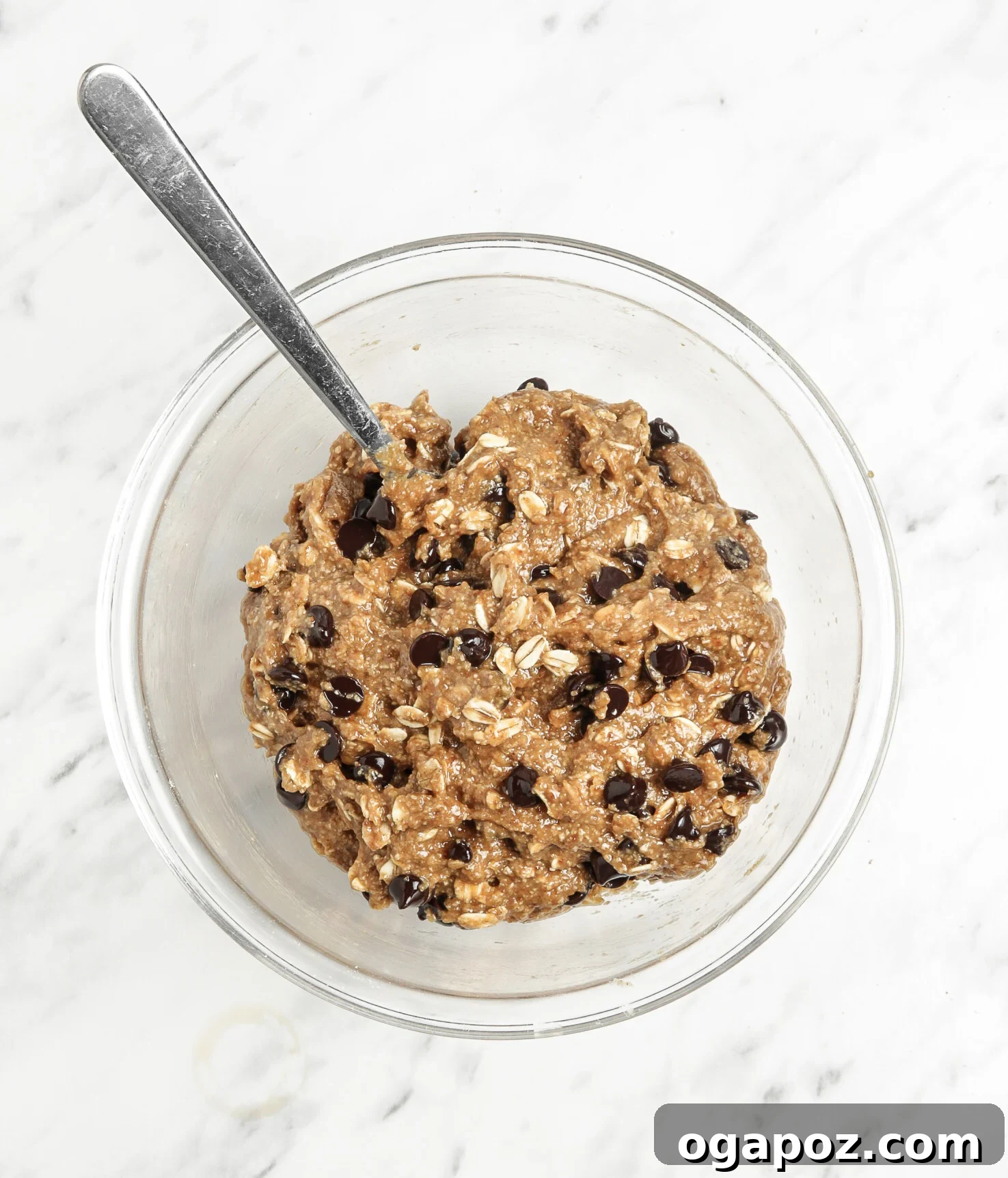 Soft-Baked Banana Oatmeal Cookies 7 Homemade Banana Oatmeal Cookies dough with chocolate chips and oats folded in.