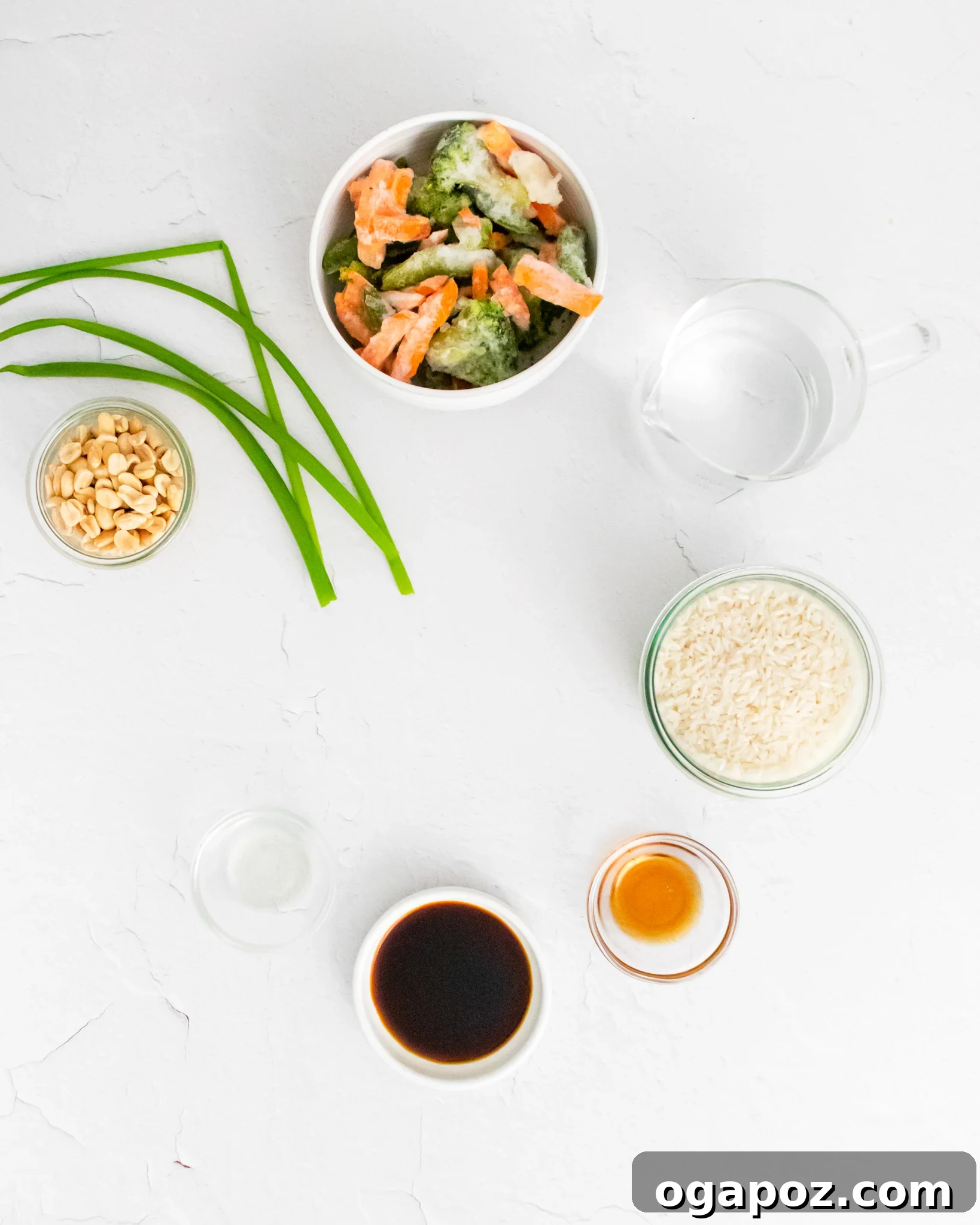 Effortless Instant Pot Fried Rice 3 Various Instant Pot Fried Rice ingredients laid out on a surface.