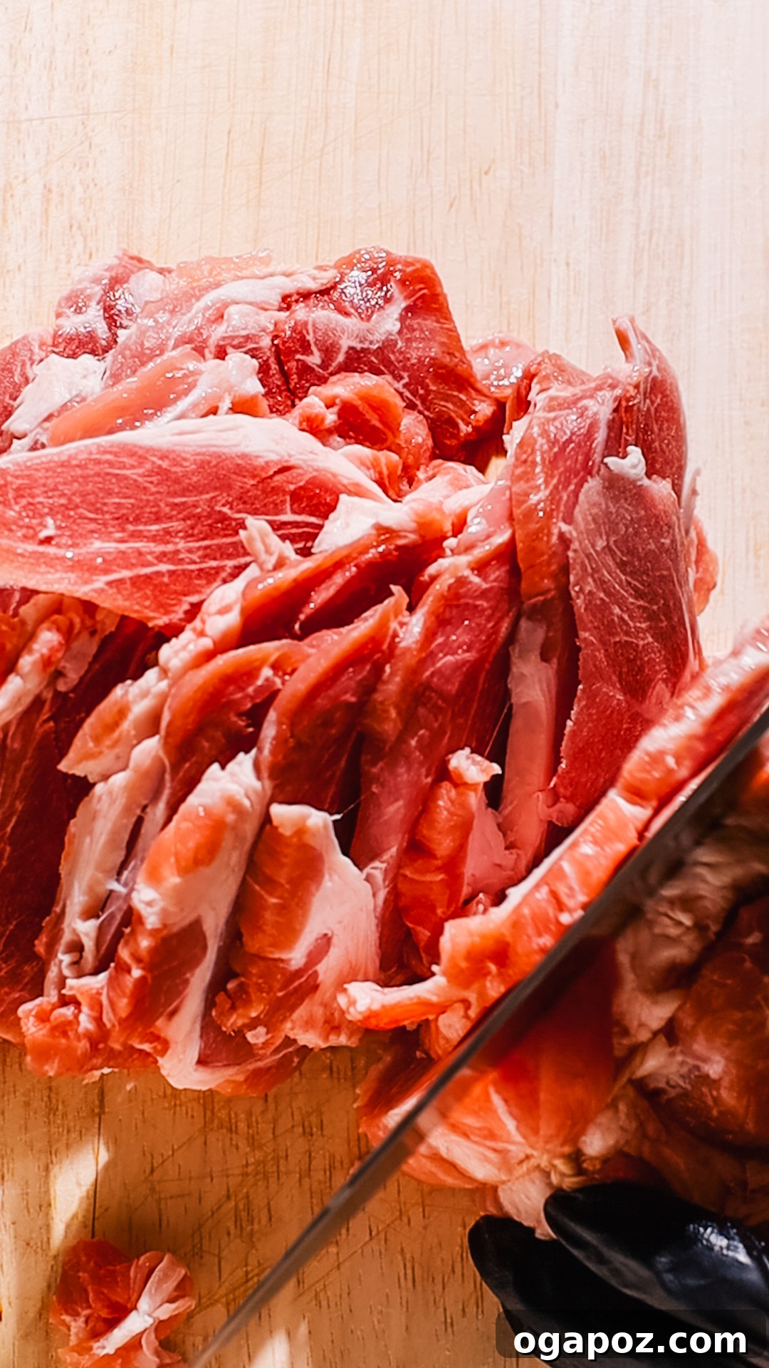 Effortless Tacos Al Pastor Recipe 4 Thinly sliced pork shoulder, ready for marinating