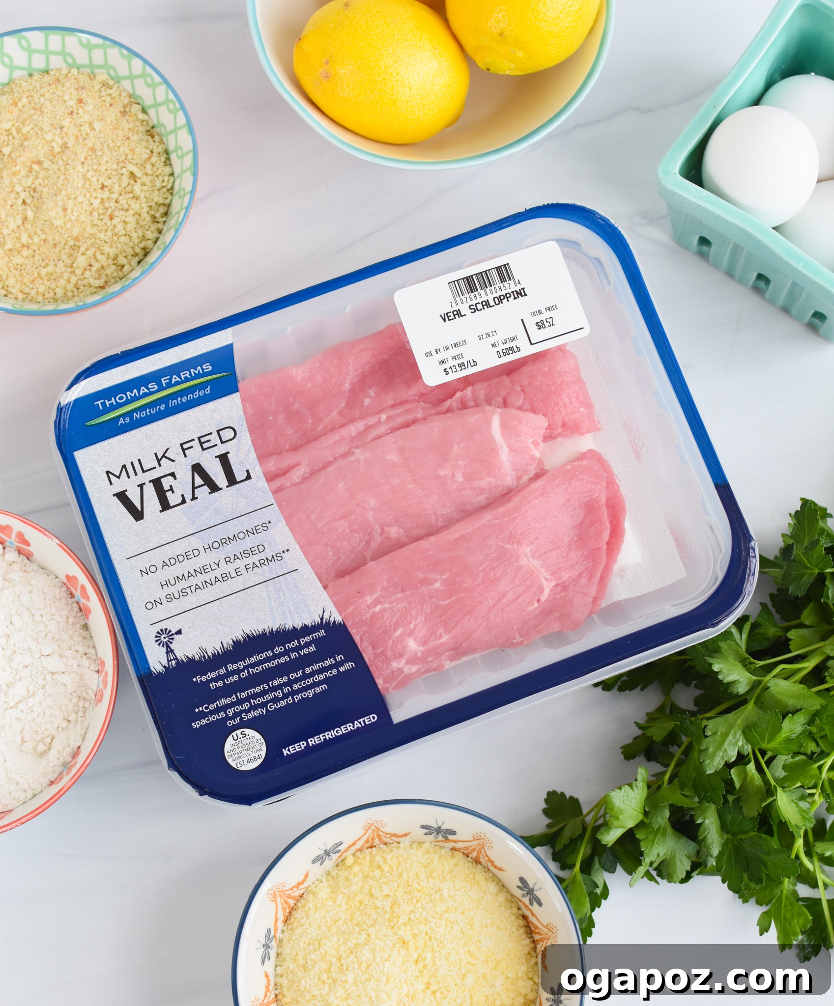 Essential ingredients for Easy Veal Milanese Recipe laid out.