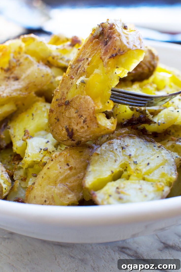 Crispy Greek Style Smashed Potatoes with herbs.