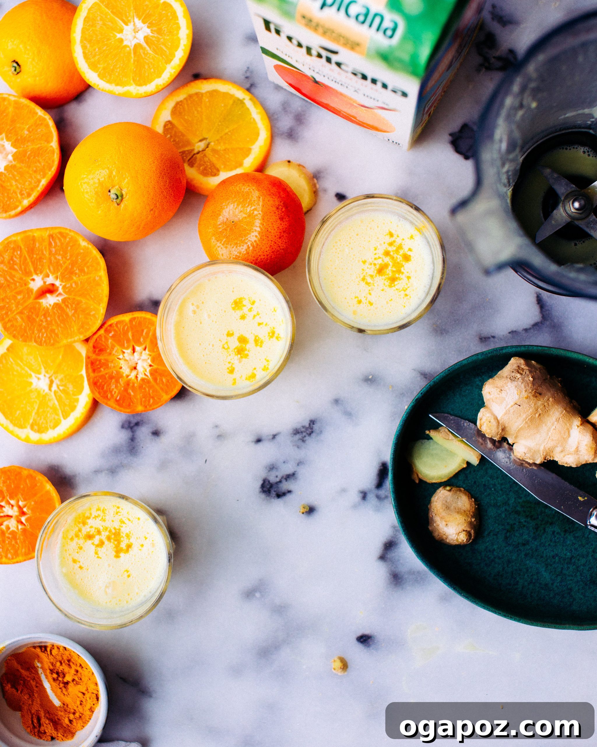 Energizing Turmeric Ginger Smoothie A vibrant golden Turmeric and Ginger Immunity Smoothie in a glass, ready to be enjoyed.