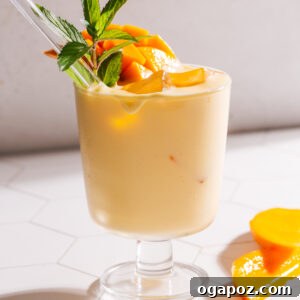 Mango Lassi in glass with mint